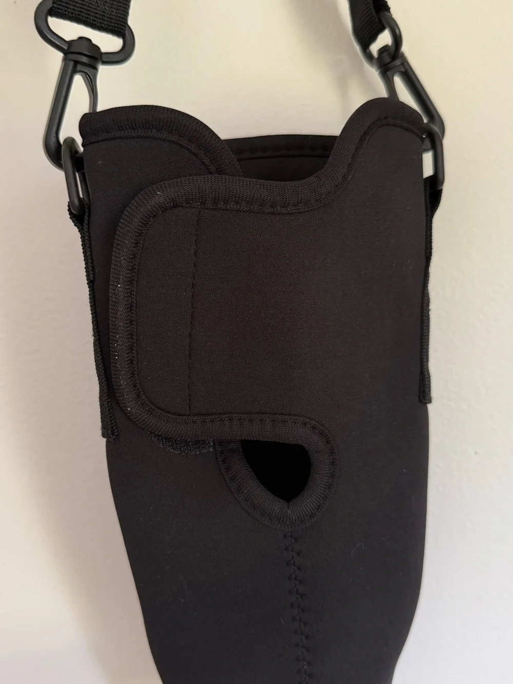 Black Crossbody Water bottle Sling Bag with zippered phone pocket and key ring